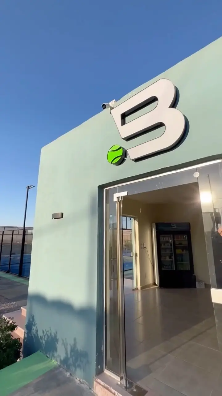 The Baseline Courts entrance with the club's B logo